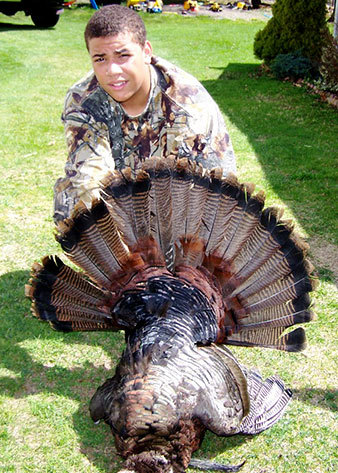 Youth hunter with his turkey.