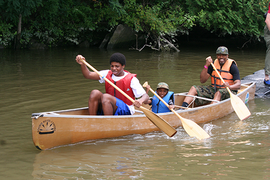 People paddling in a canoe