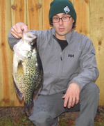 Evan Walsh holding a near record crappie