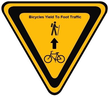 Yield to foot traffic sign