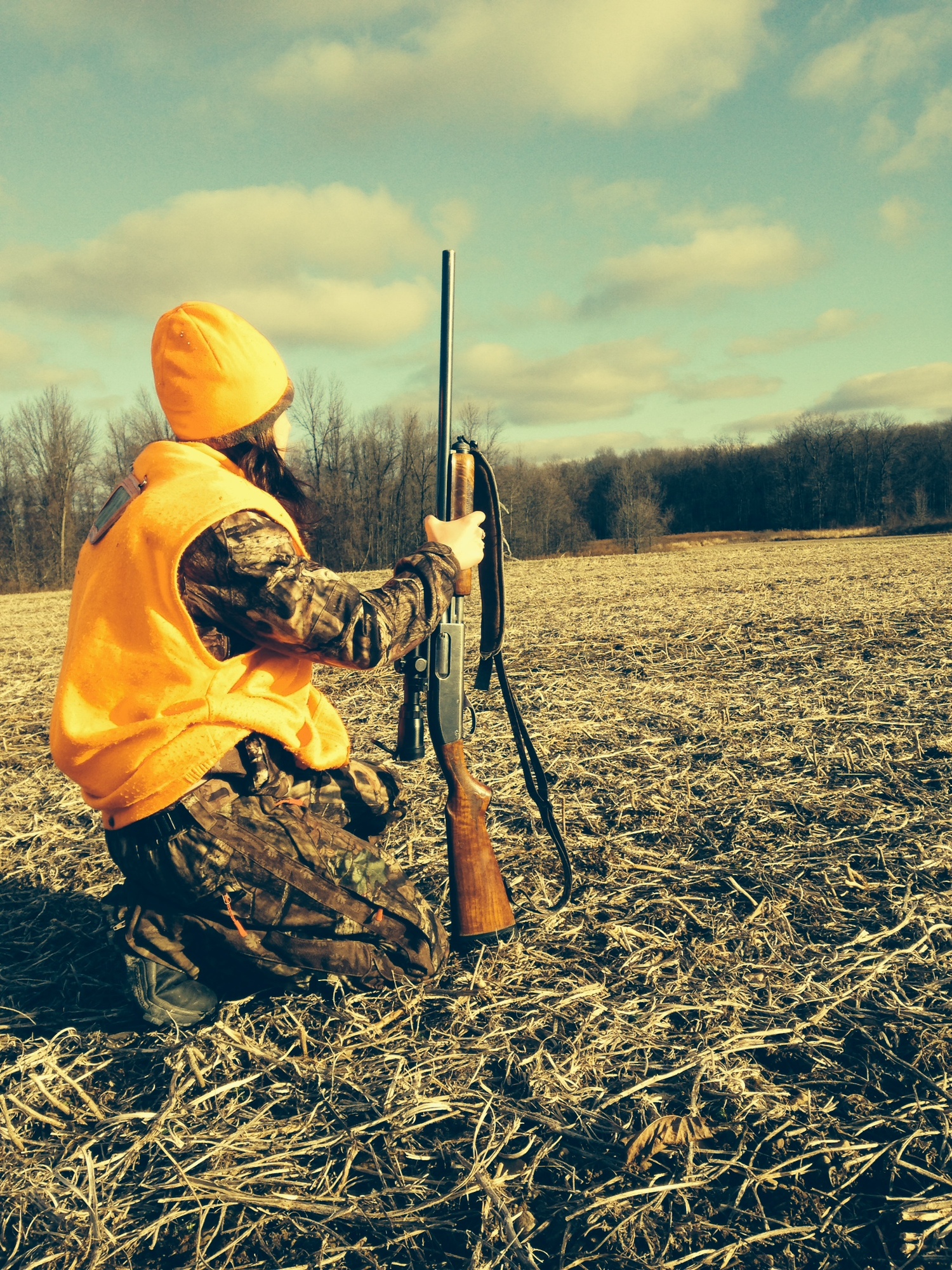 woman in a field, big game hunting