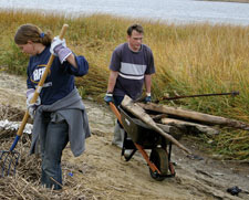 Volunteers cleaning up a shoreline