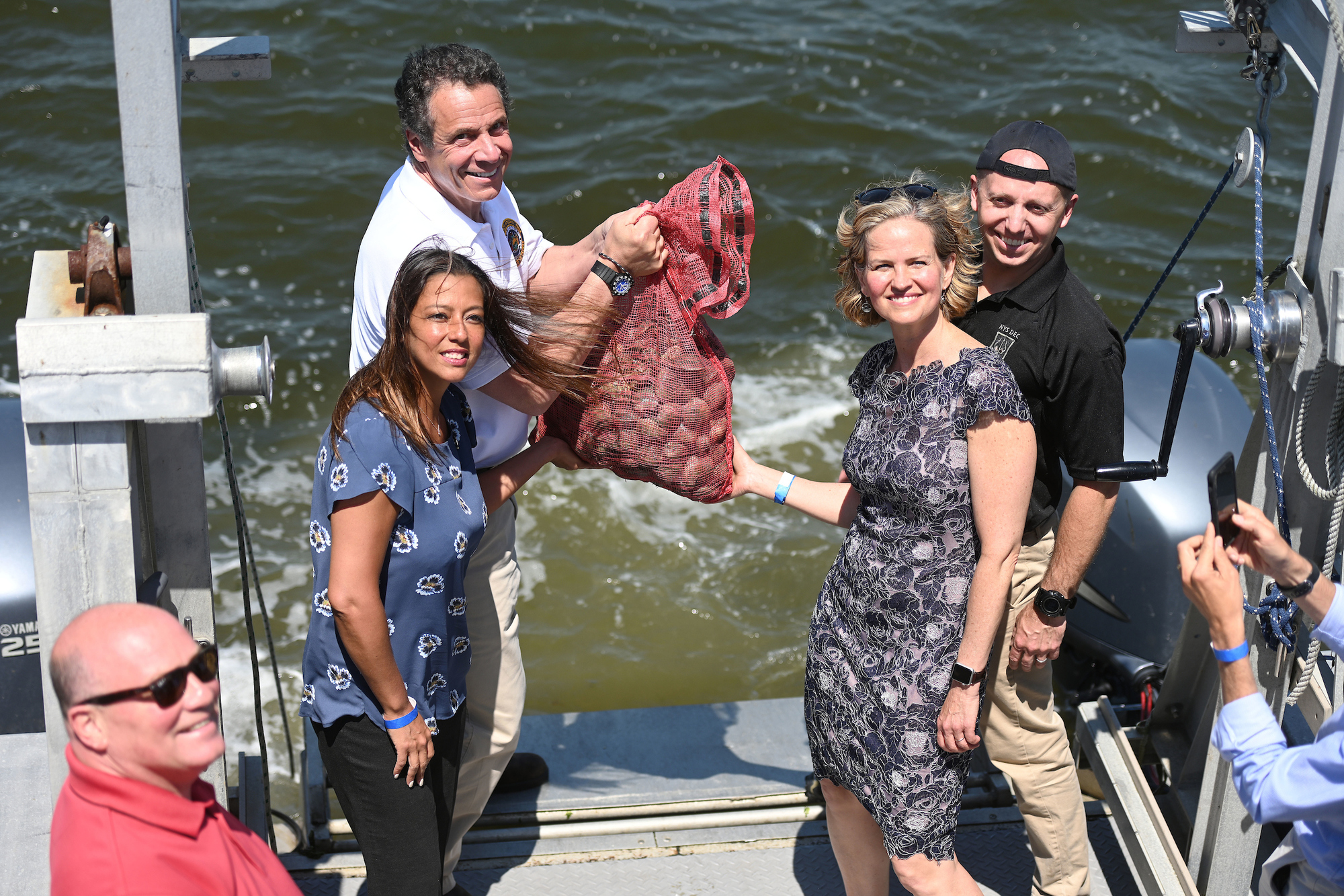 Planting clams in Bellport Bay