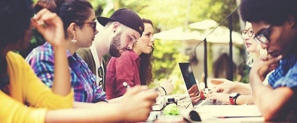 Group of students sitting around a table