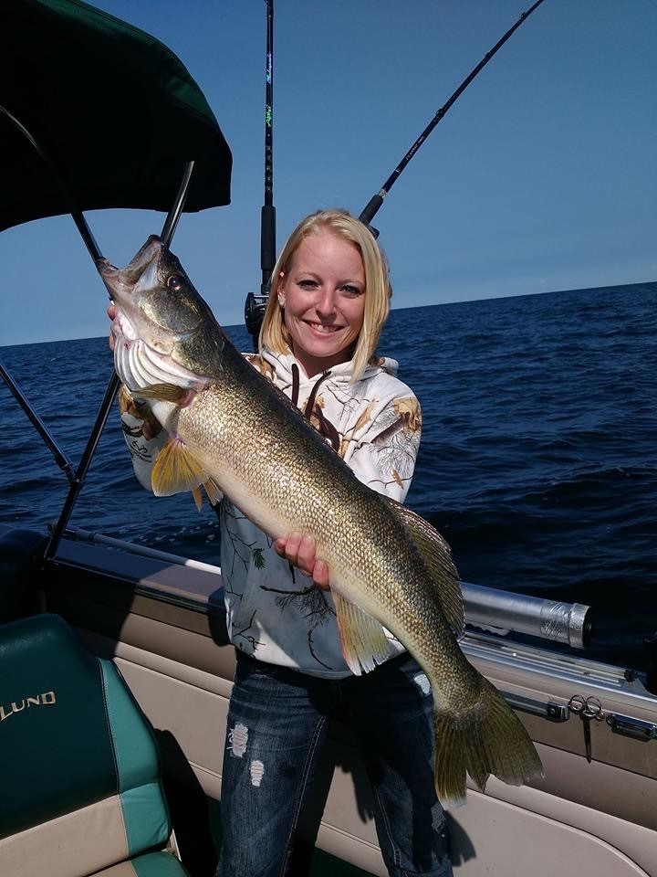Woman holding fish from Lake Erie