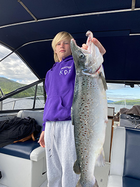 Young angler with landlocked salmon