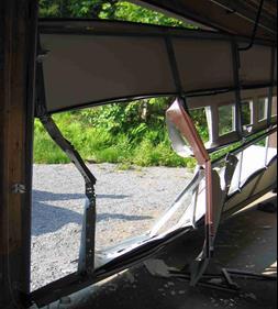 damage to garage caused by bear