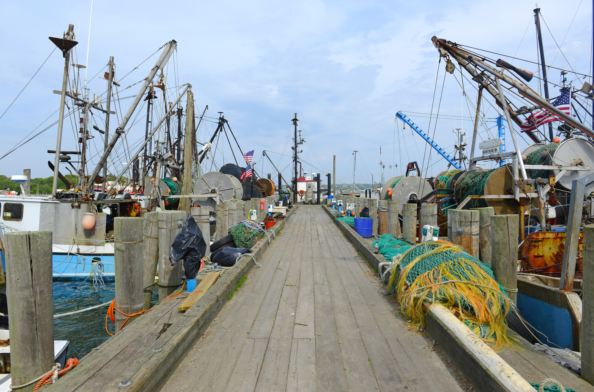 Commercial fishing boats and gear at a fishing dock