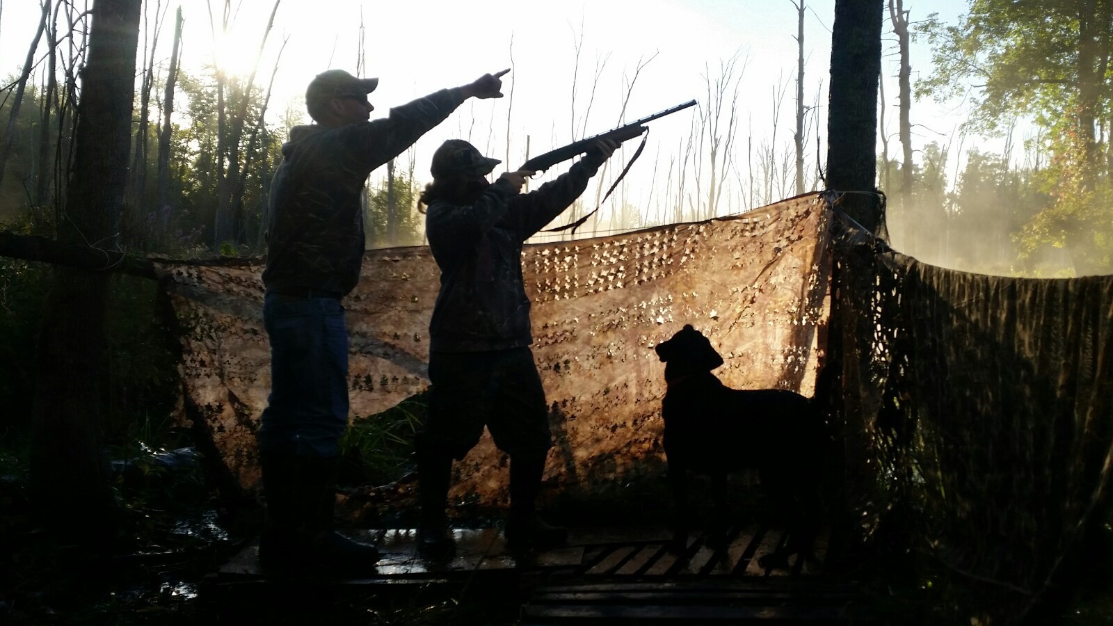 silhouettes of hunters by S. Usherwood