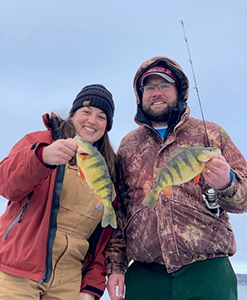 Ice anglers with yellow perch