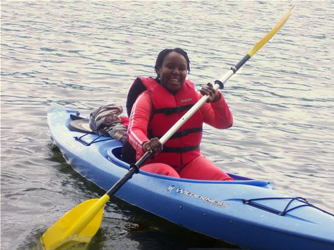 woman kayaking