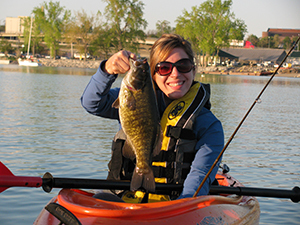 Angler with smallmouth bass