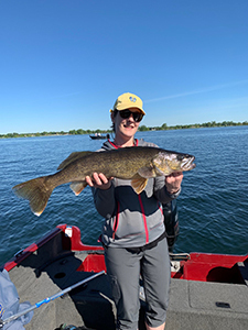 Angler with walleye