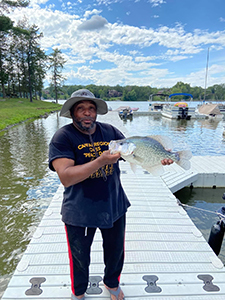 Angler with state record white crappie