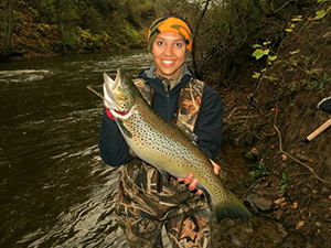 Female angler with brown trout