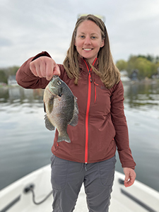 Angler with large bluegill sunfish