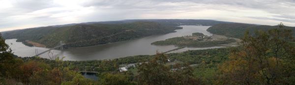 Aerial view of the Hudson River showing the Bear Mountain Bridge and the bend in the river.
