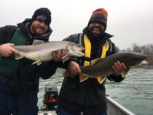 Anglers on boat wearing life jackets