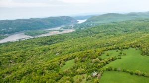aerial view of the Hudson Highlands showing the Hudson River and surrounding landscape.