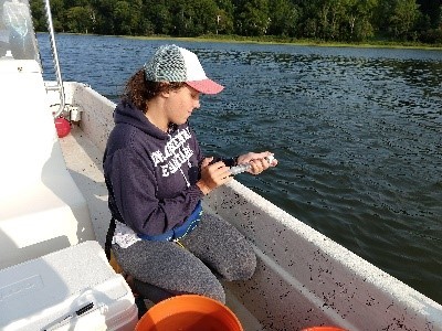 collecting water quality sample