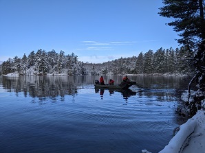 DEC staff netting from boat