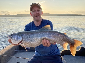 David Gordon holding up lake trout