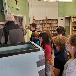 Students observing eggs in classroom 