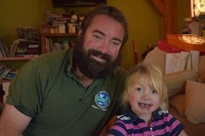 Ian smiling with his daughter 