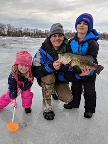 Steve Ice fishing with family