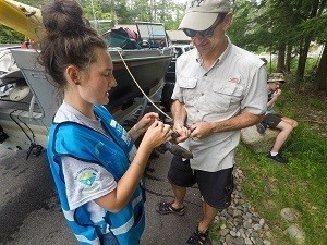 Boat steward checking a boat
