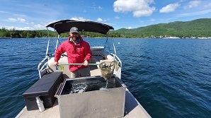 DEC staff stocking Lake George