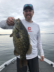 Angler with St. Lawrence River Smallmouth Bass