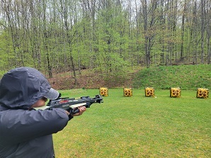 Hunter Education student learning how to use a crossbow