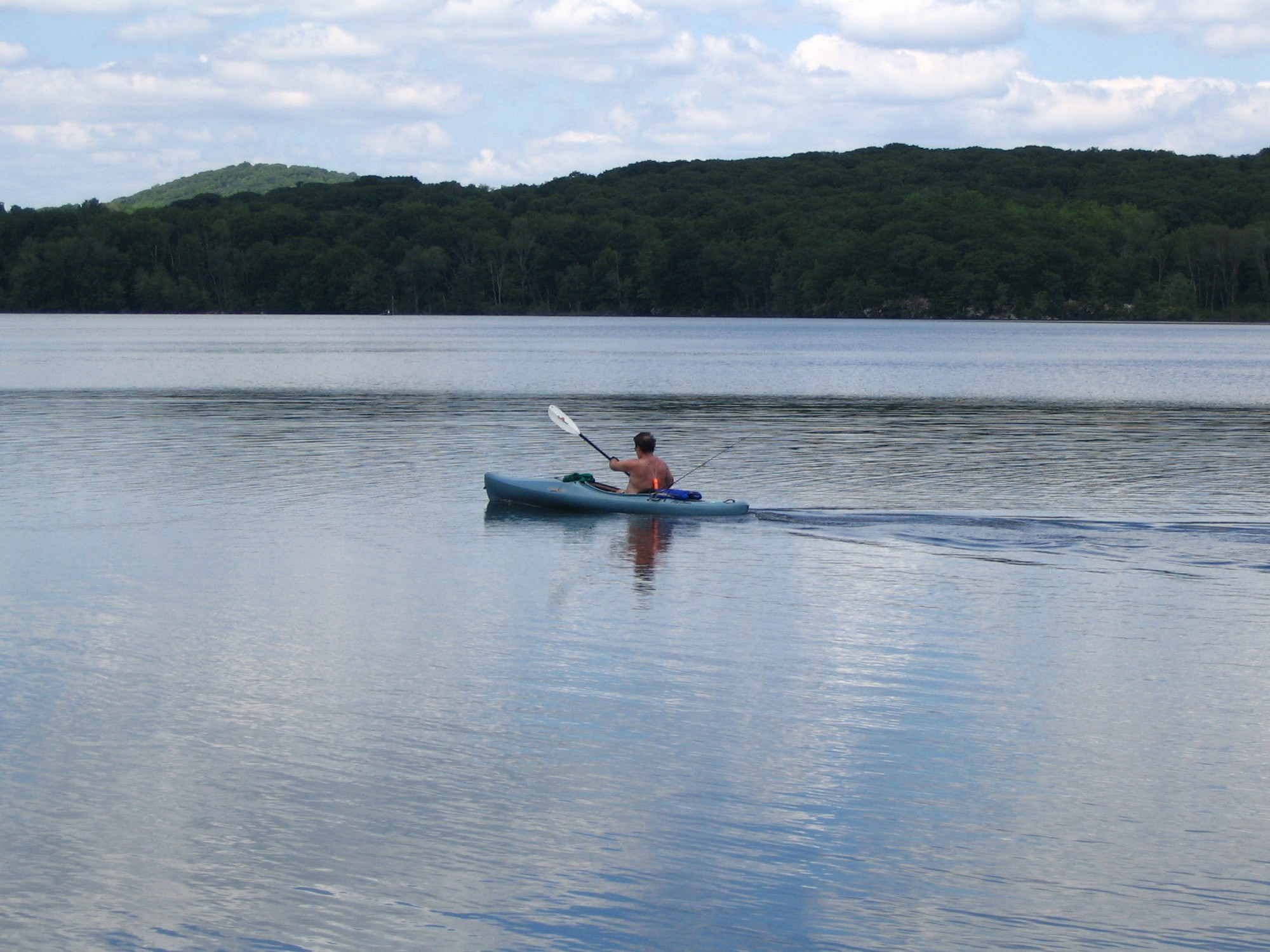 Person kayaking in White Pond Multiple Use Area.