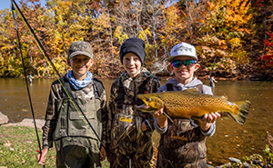 Young fly anglers on a Lake Ontario tributary