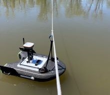 A small boat device in water.