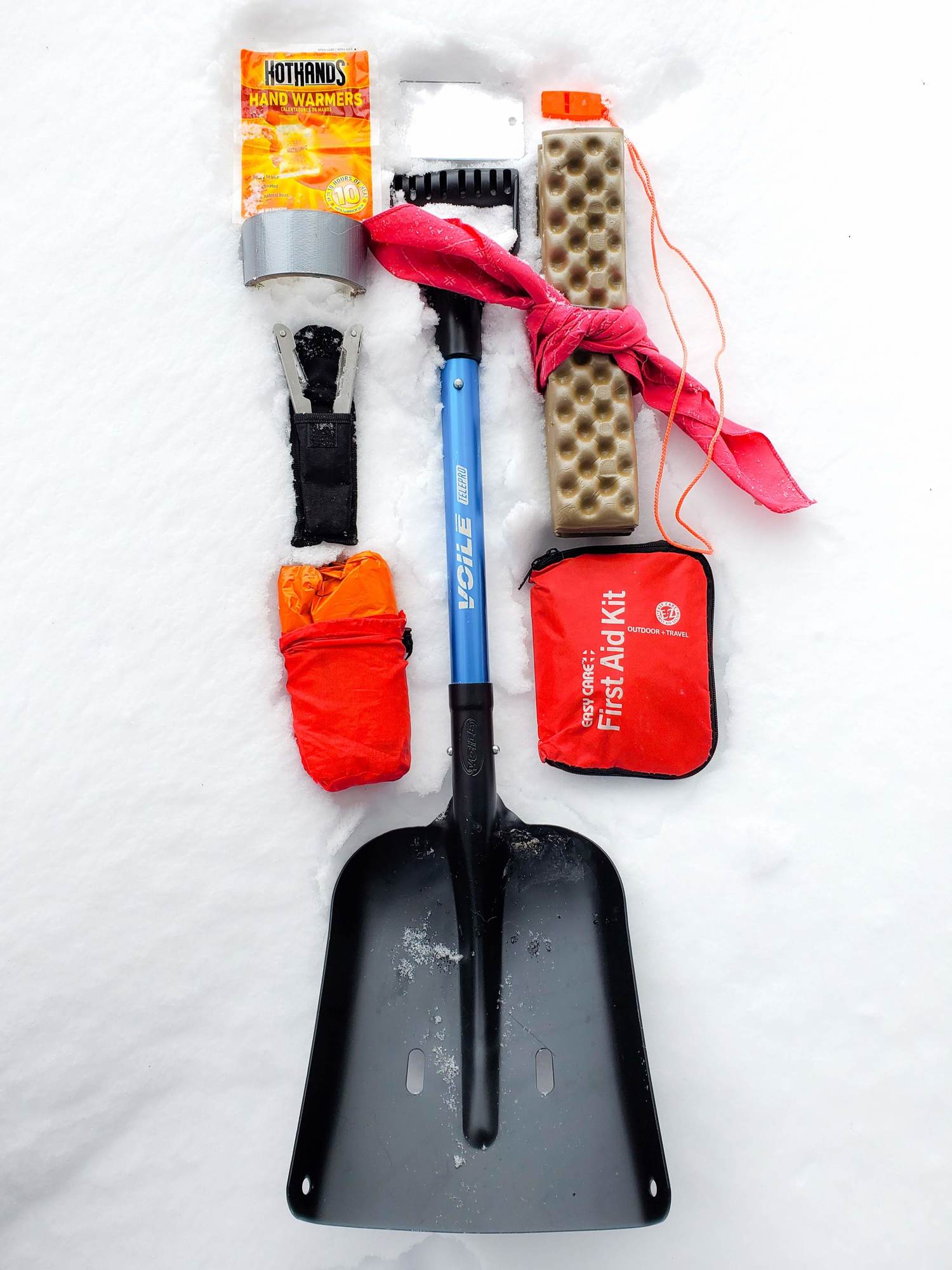 Gear in a Winter Emergency Kit on Snow