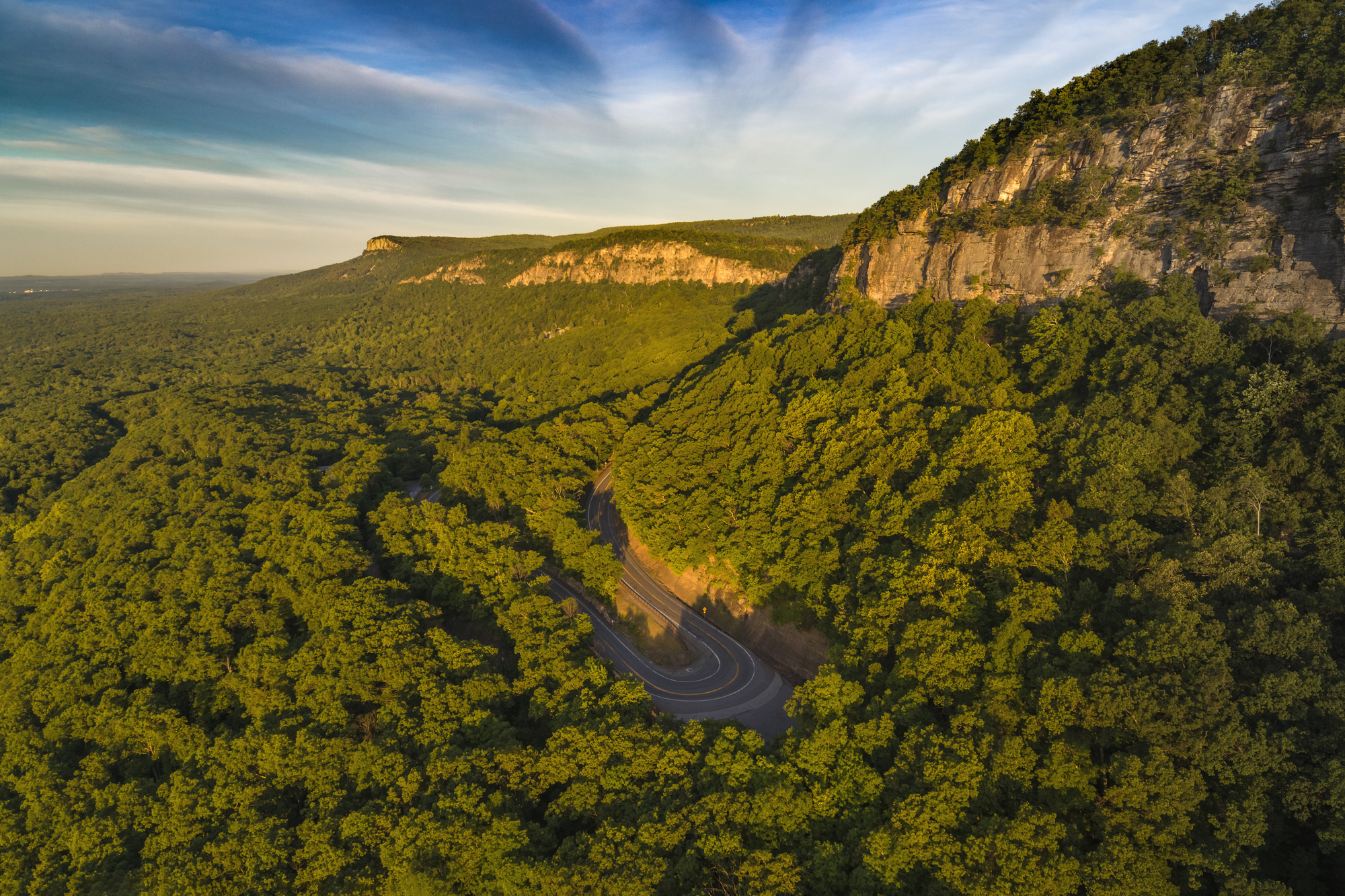 An aerial view of Mohonk Preserve ridge with the road leading up to it