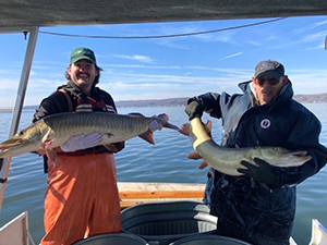Staff with ripe female muskellunge