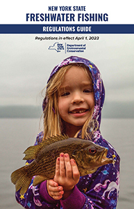 Freshwater Fishing Regulations Guide Cover, little girl holding a fish