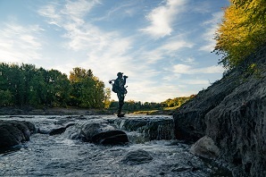 Hunter in River