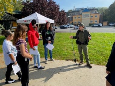 Ranger speaking to a group of people