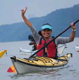 A young woman in kayak