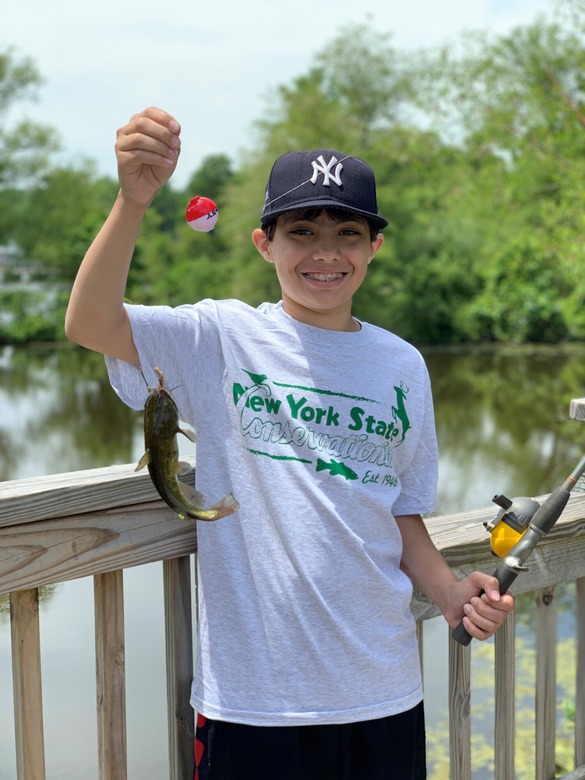 Kid with Caught Fish at Get Outdoors Day