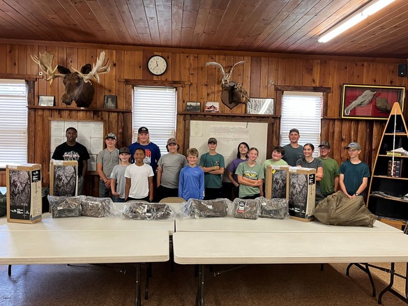 youth hunters with prizes donated