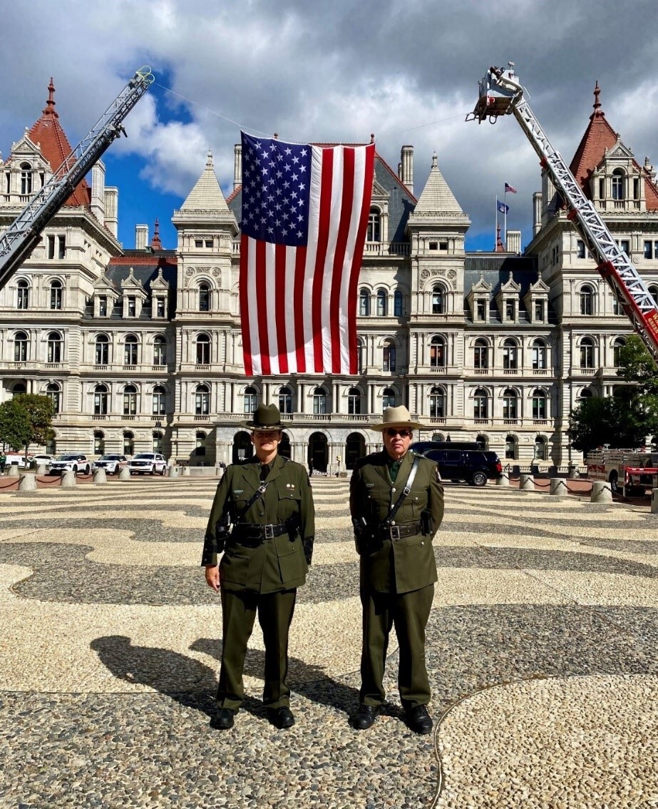 ECOs in front of Capitol Building with U.S. Flag