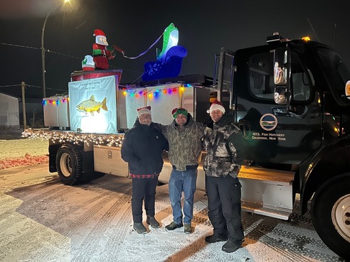 Fish stocking truck decorated in Christmas lights