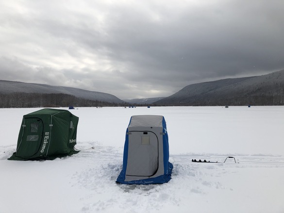Two shanties set up on the ice
