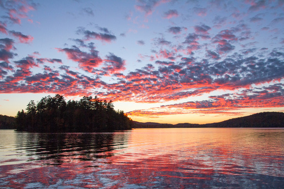 Sunset reflecting on a lake.