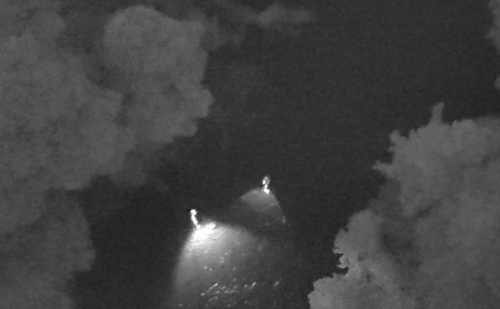 black and white screen shot from drone footage